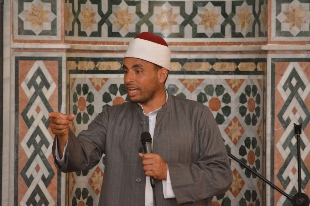 Cairo, Egypt, June 14 2022: A mosque preacher Imam performs a religious Khutbah (sermon) for Muslims inside a mosque during the summer Islamic educational program in the mosque