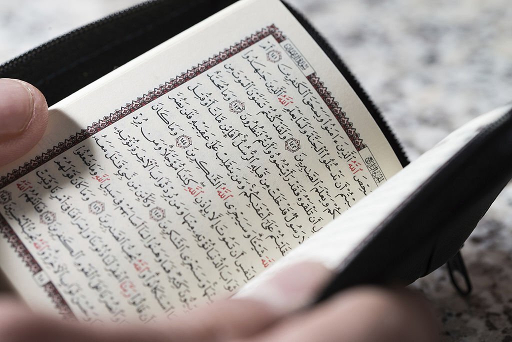 Muslim Man Is Reading The Koran
