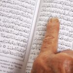 Senior Woman Reading Holy Qur'an